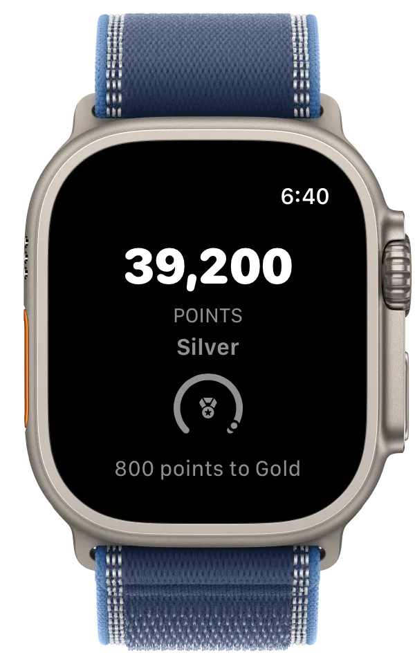 Apple Watch face showing Fitness Quotient's current rank and live month-to-date point total.
